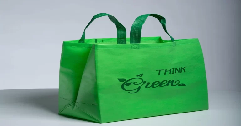 A green color shopping bag suggesting tourists to buy eco friendly things